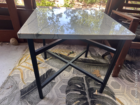 A square table with an X structure